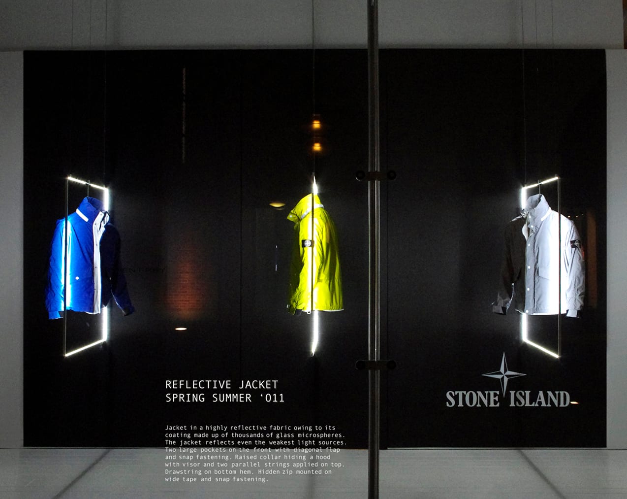 Stone Island reflective jacket shop window design